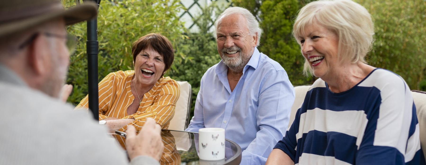 a group of people sitting outside